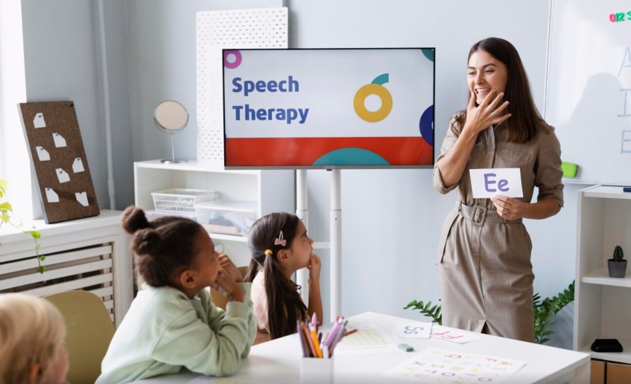 Speech therapist conducting a session with young children